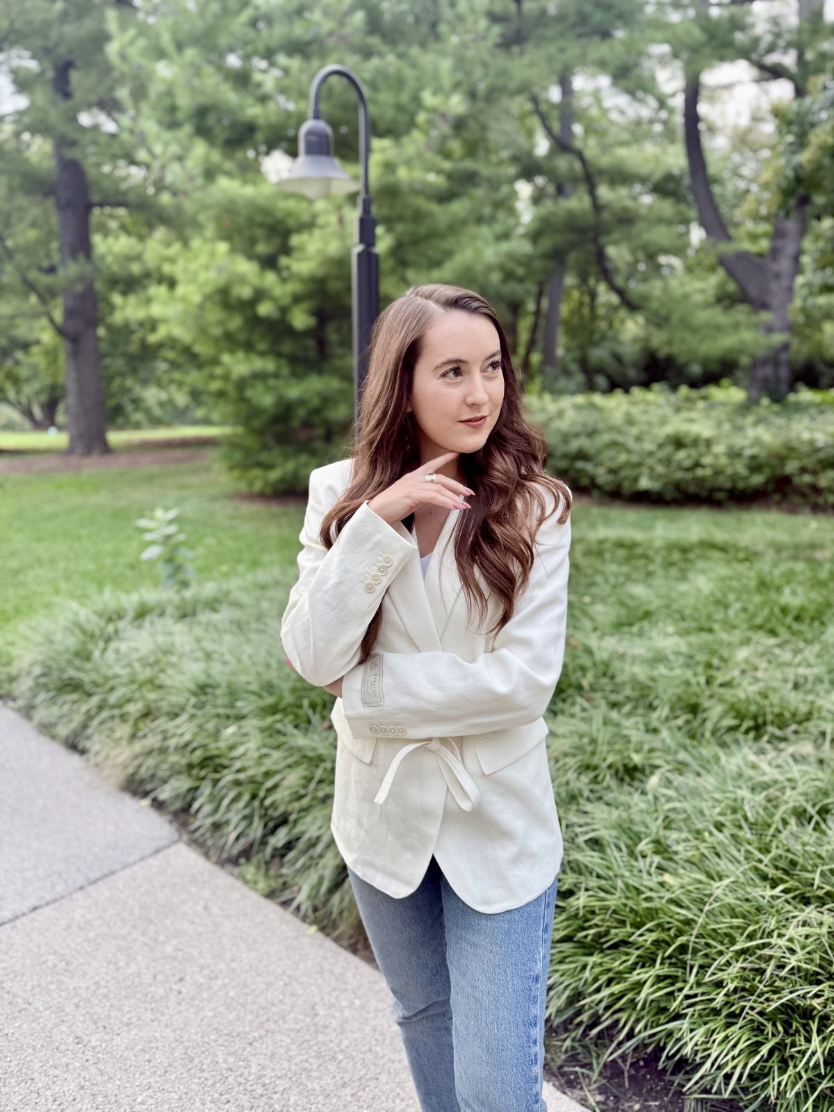 Jacquelyn in a white blazer for event and retreat support
