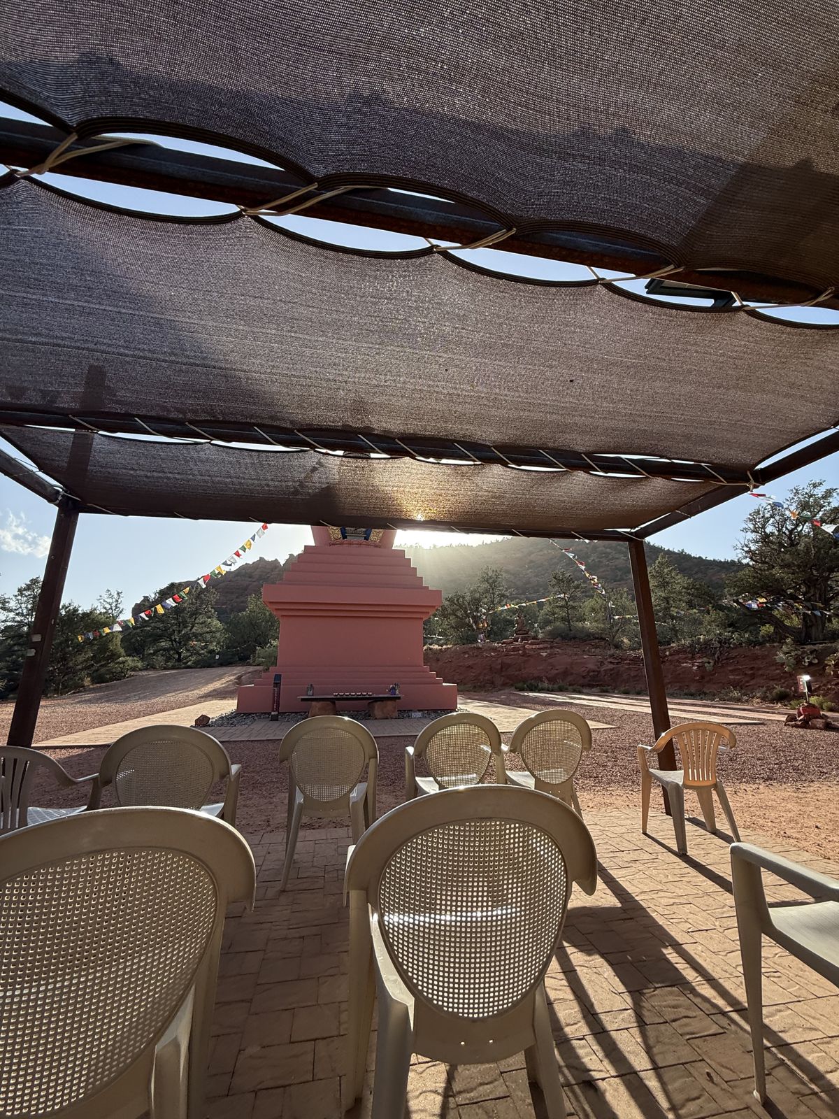 Empty chairs facing the Amitabha Stupa in Sedona