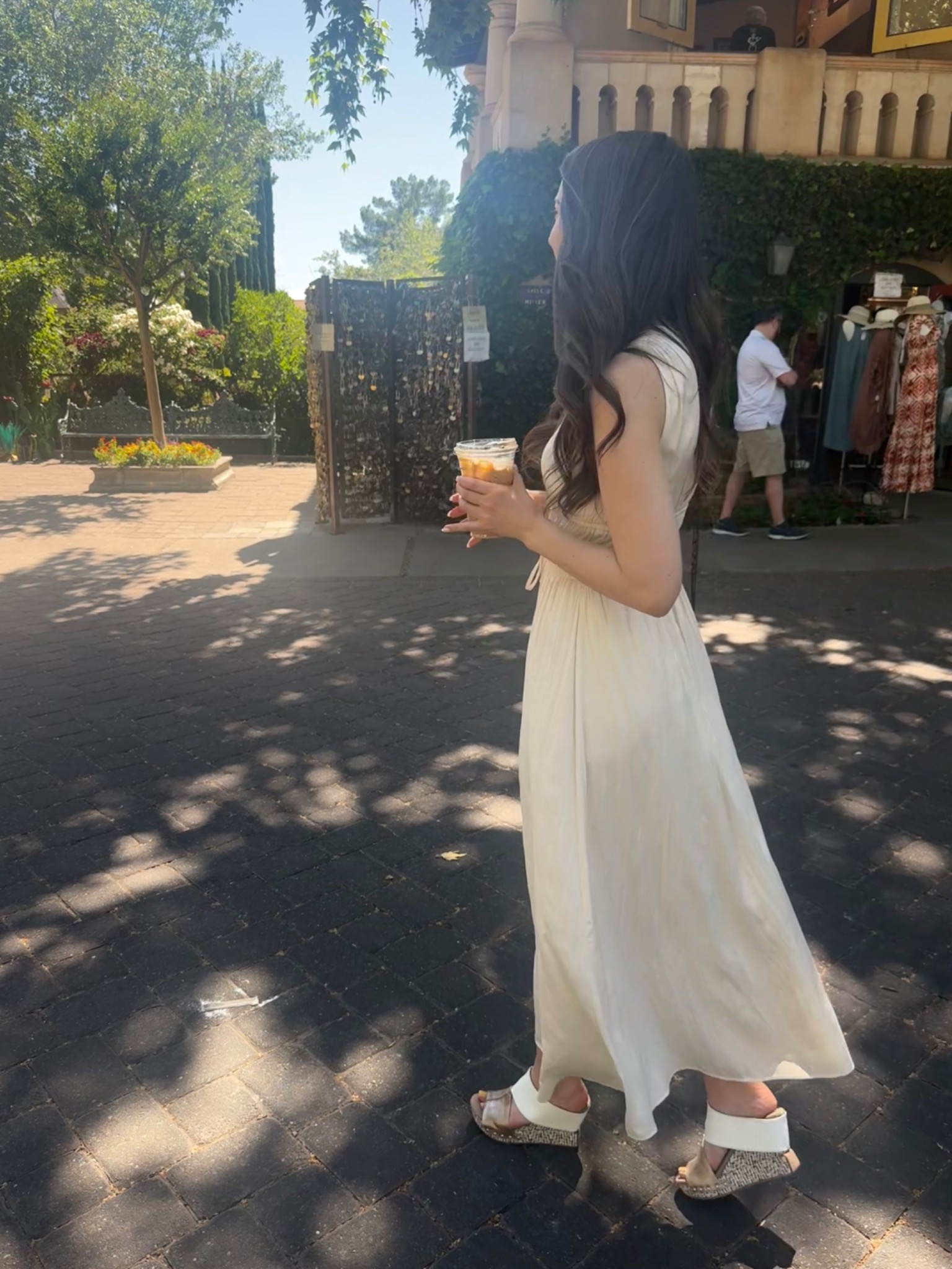 Jacquelyn walking through a beautiful destination setting